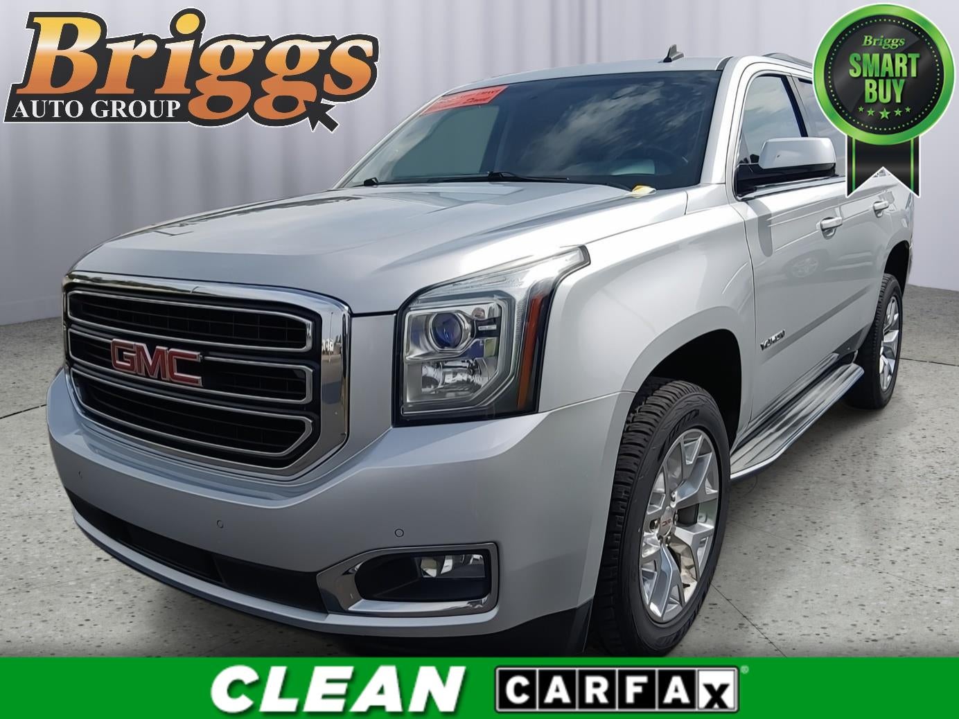 2015 GMC Yukon SLE in Quicksilver Metallic — front three-quarter view