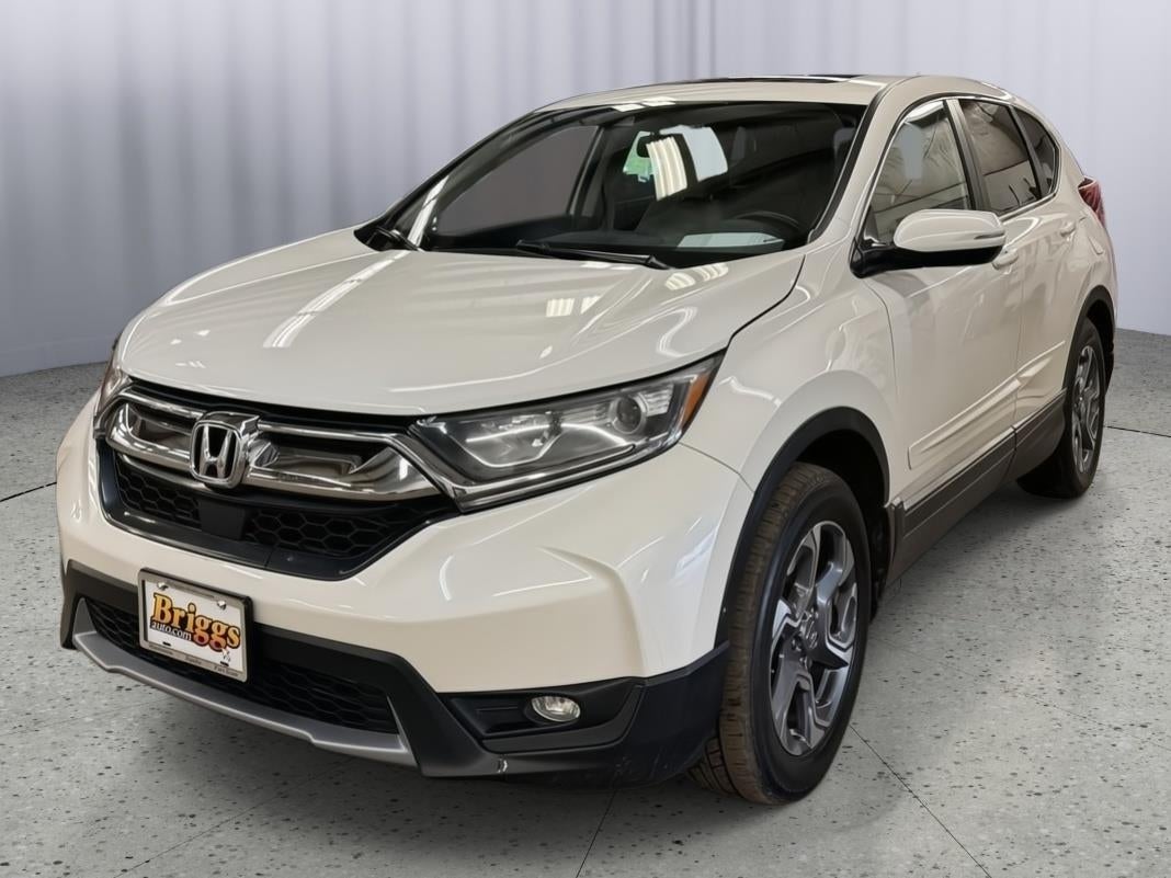 2018 Honda CR-V EXL in White Diamond Pearl — front three-quarter view