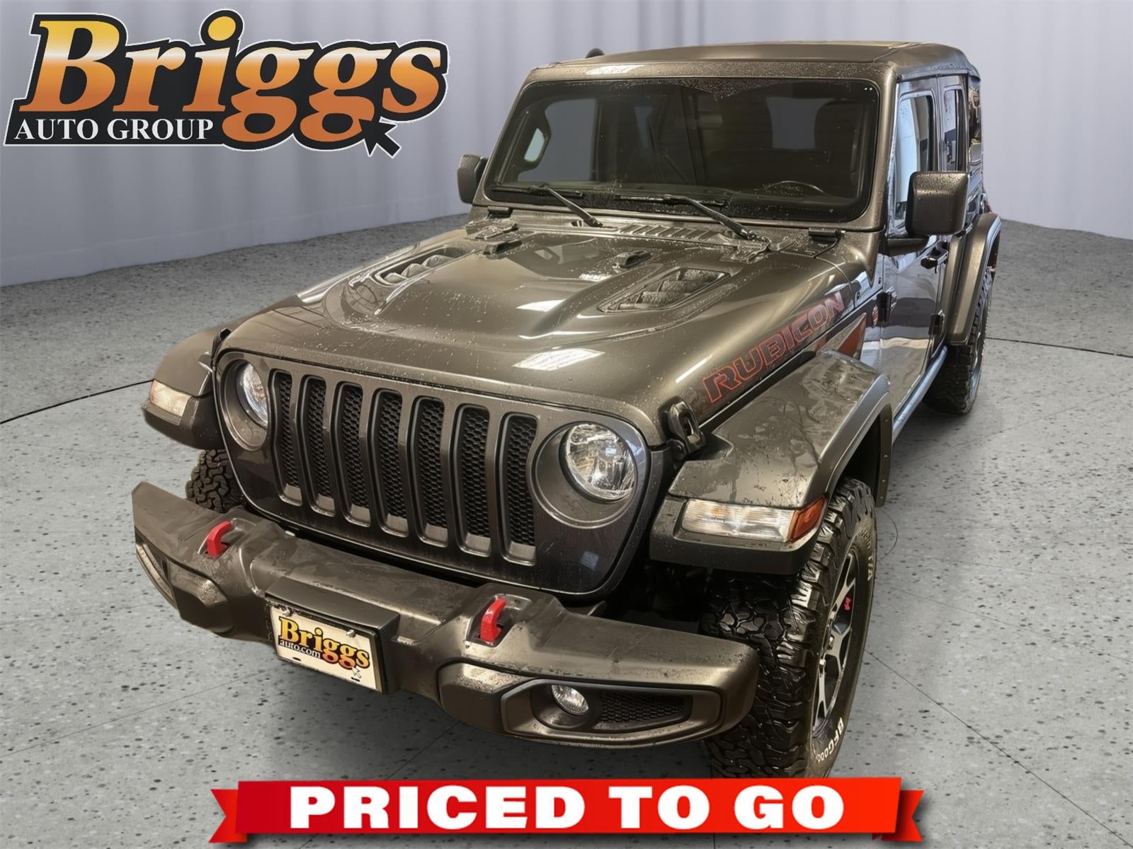 2021 Jeep Wrangler Unlimited Rubicon in Granite Crystal Metallic Clearcoat — front three-quarter view