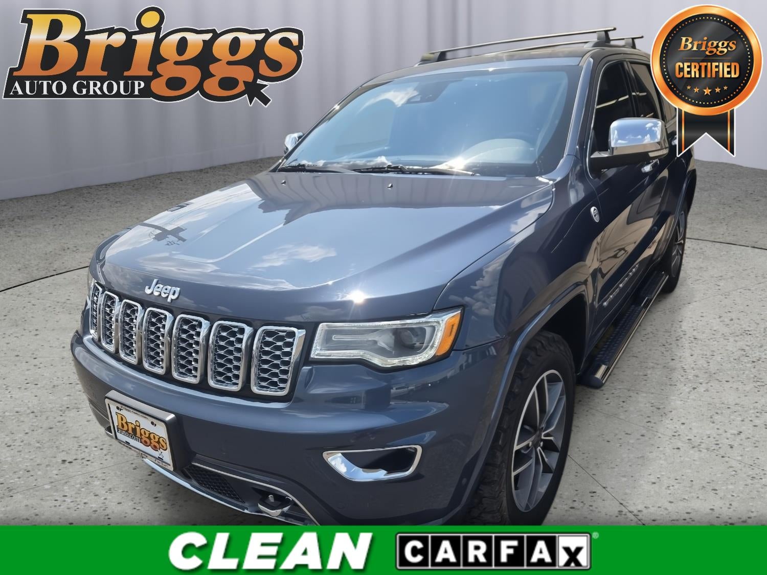 2019 Jeep Grand Cherokee Overland in Slate Blue Pearlcoat — front three-quarter view