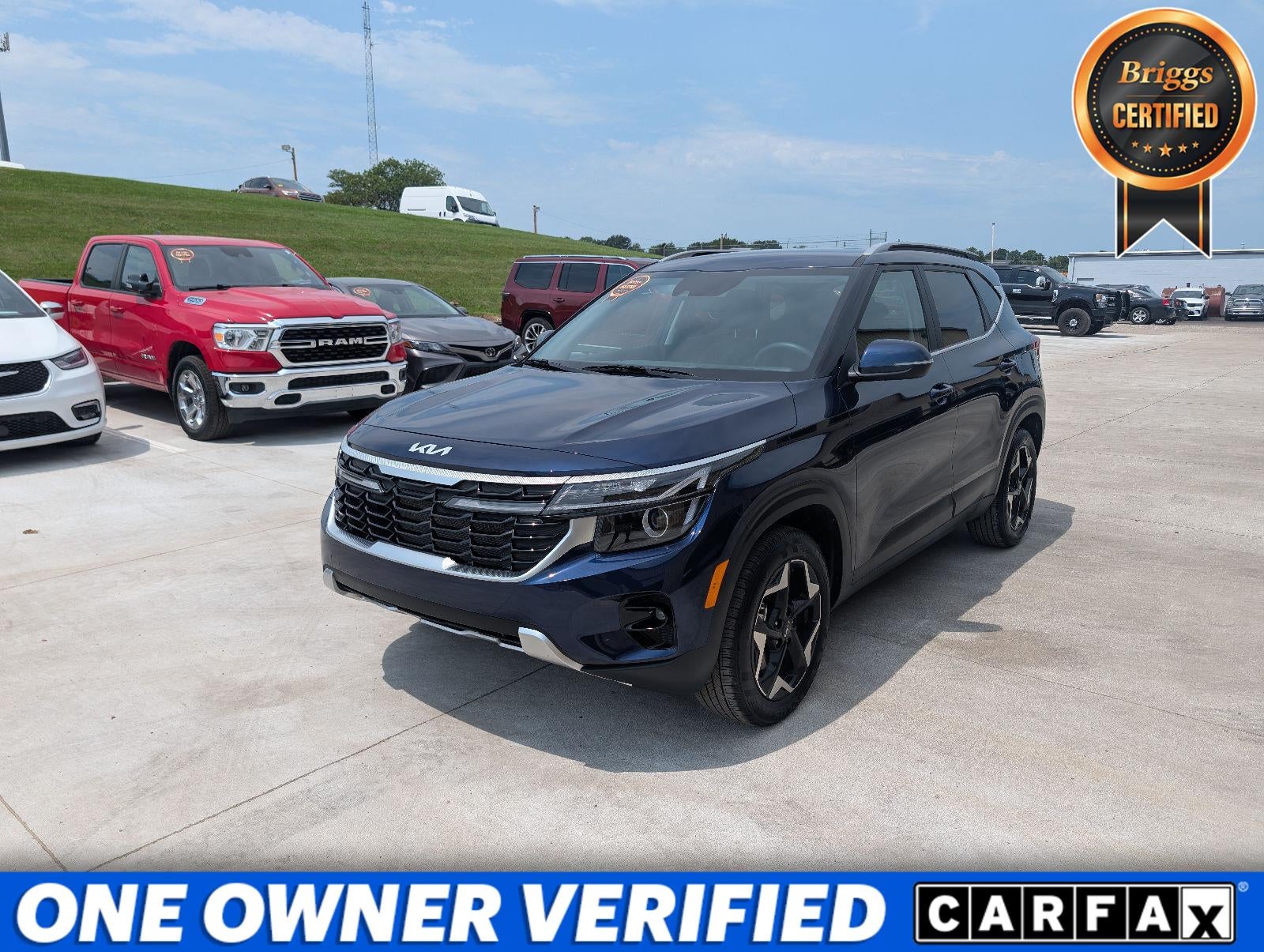 2025 Kia Seltos EX in Dark Ocean Blue — front three-quarter view