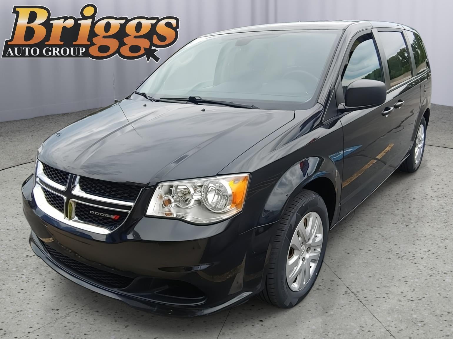 2018 Dodge Grand Caravan SE in Black Onyx Crystal Pearlcoat — front three-quarter view