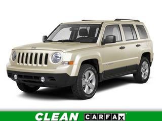 2010 Jeep Patriot Sport in Light Sandstone Metallic — front three-quarter view