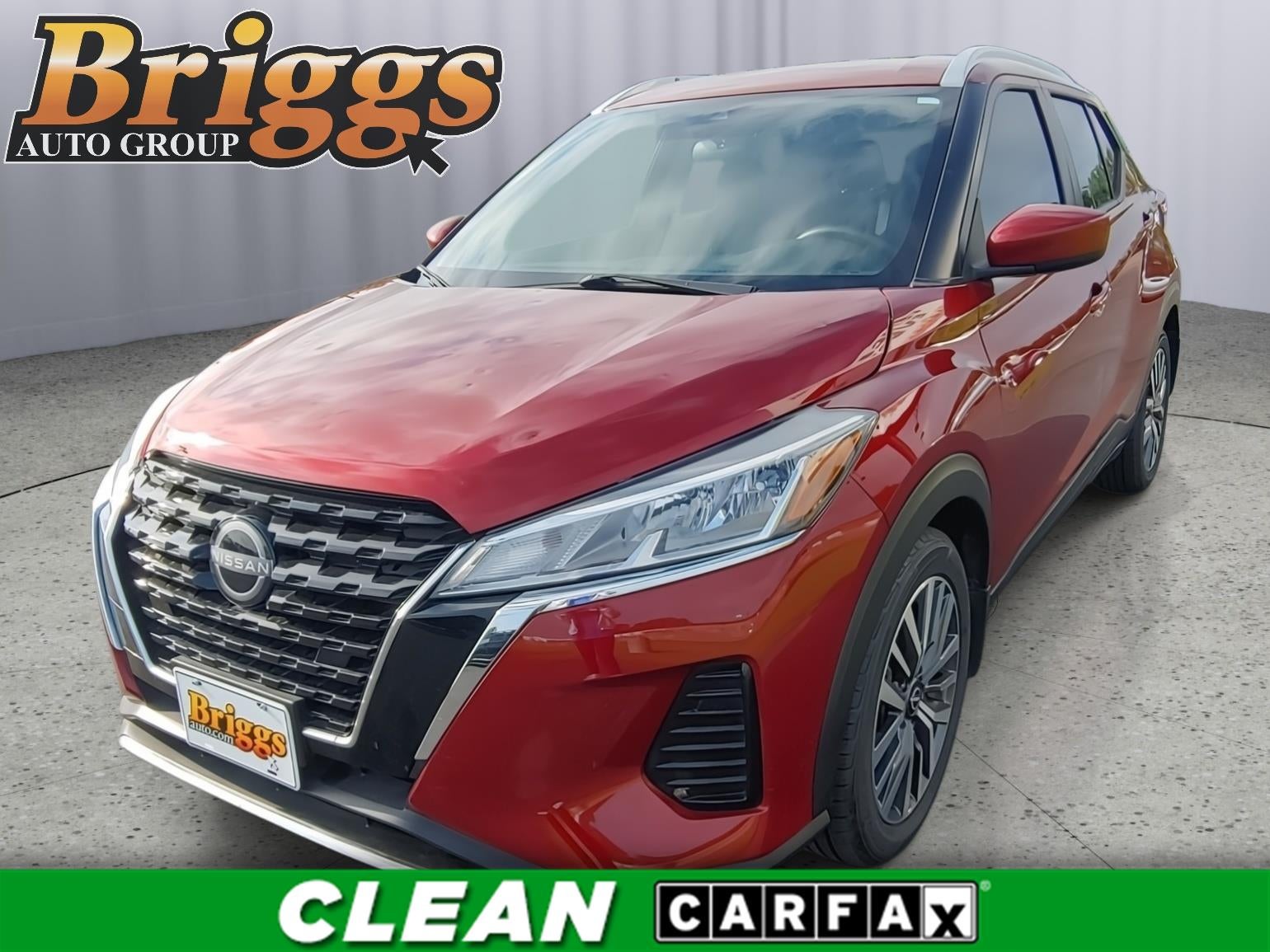 2024 Nissan Kicks SV in Scarlet Ember Tintcoat — front three-quarter view