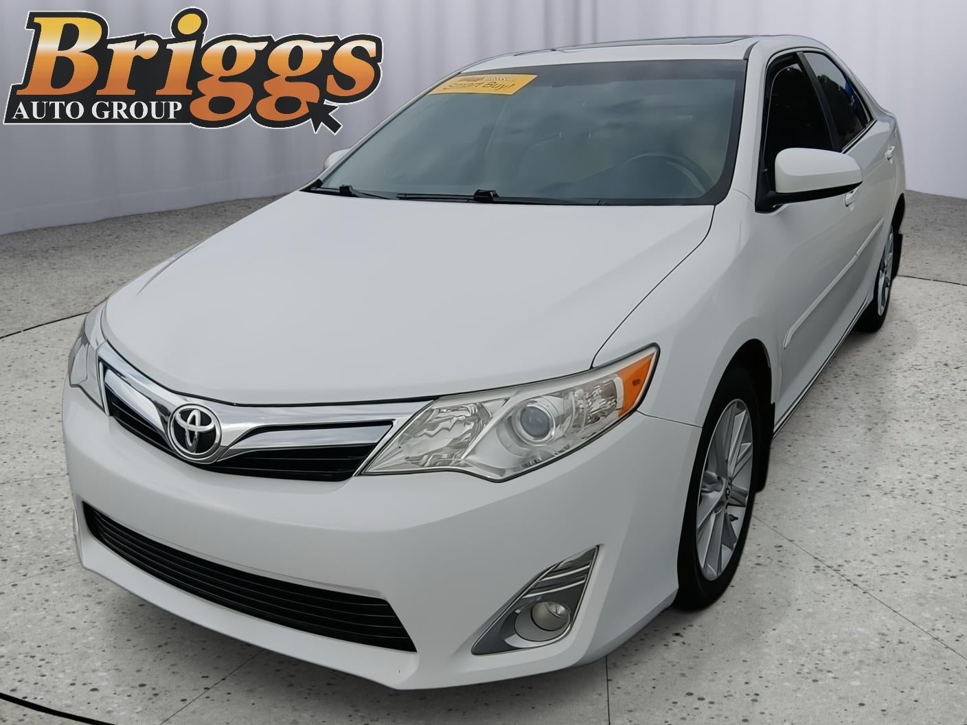 2013 Toyota Camry XLE in Super White — front three-quarter view