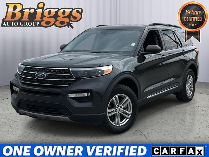 2023 Ford Explorer XLT in Forged Green Metallic — front three-quarter view